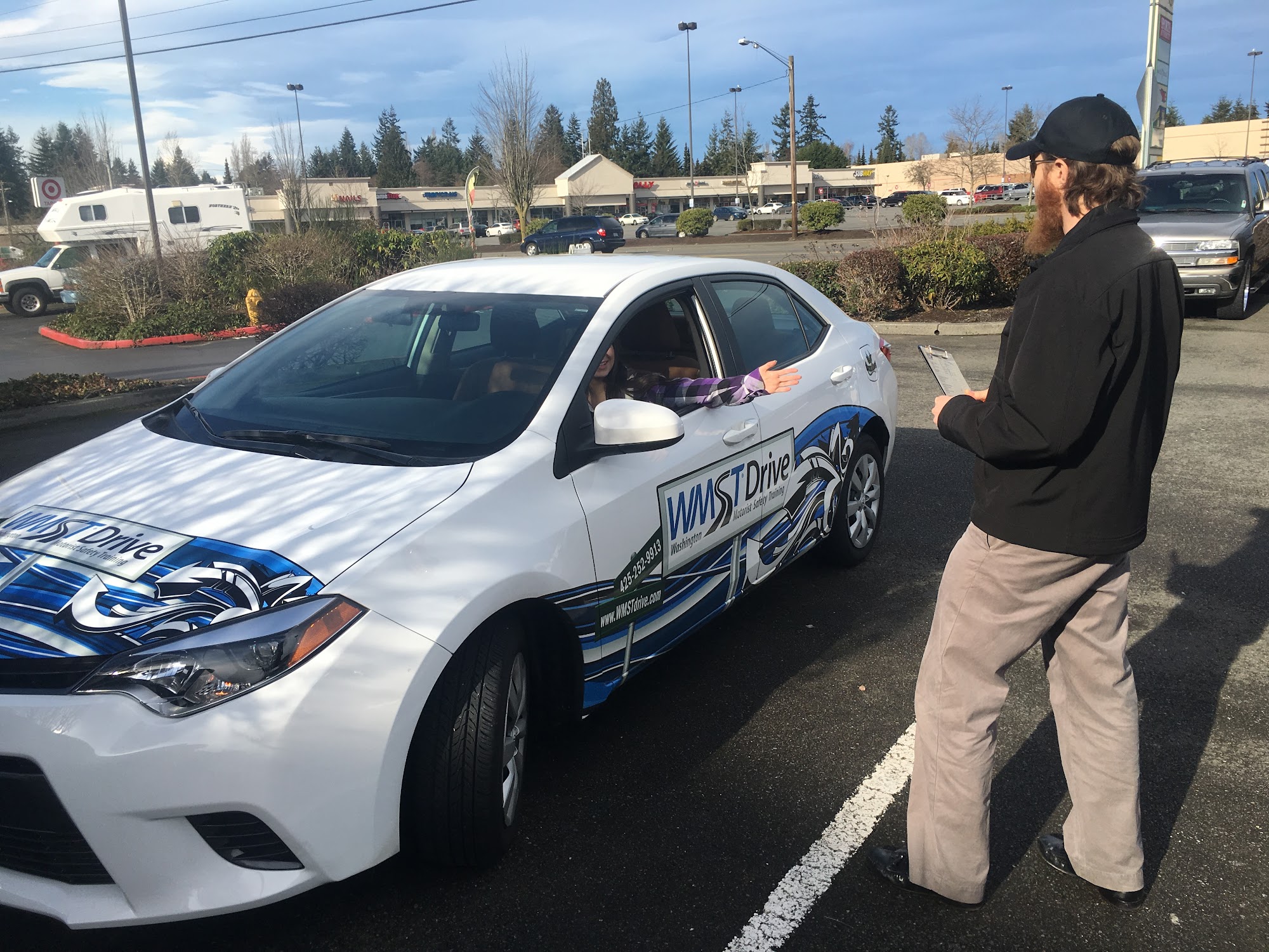 A WMST instructor with a student at the training car